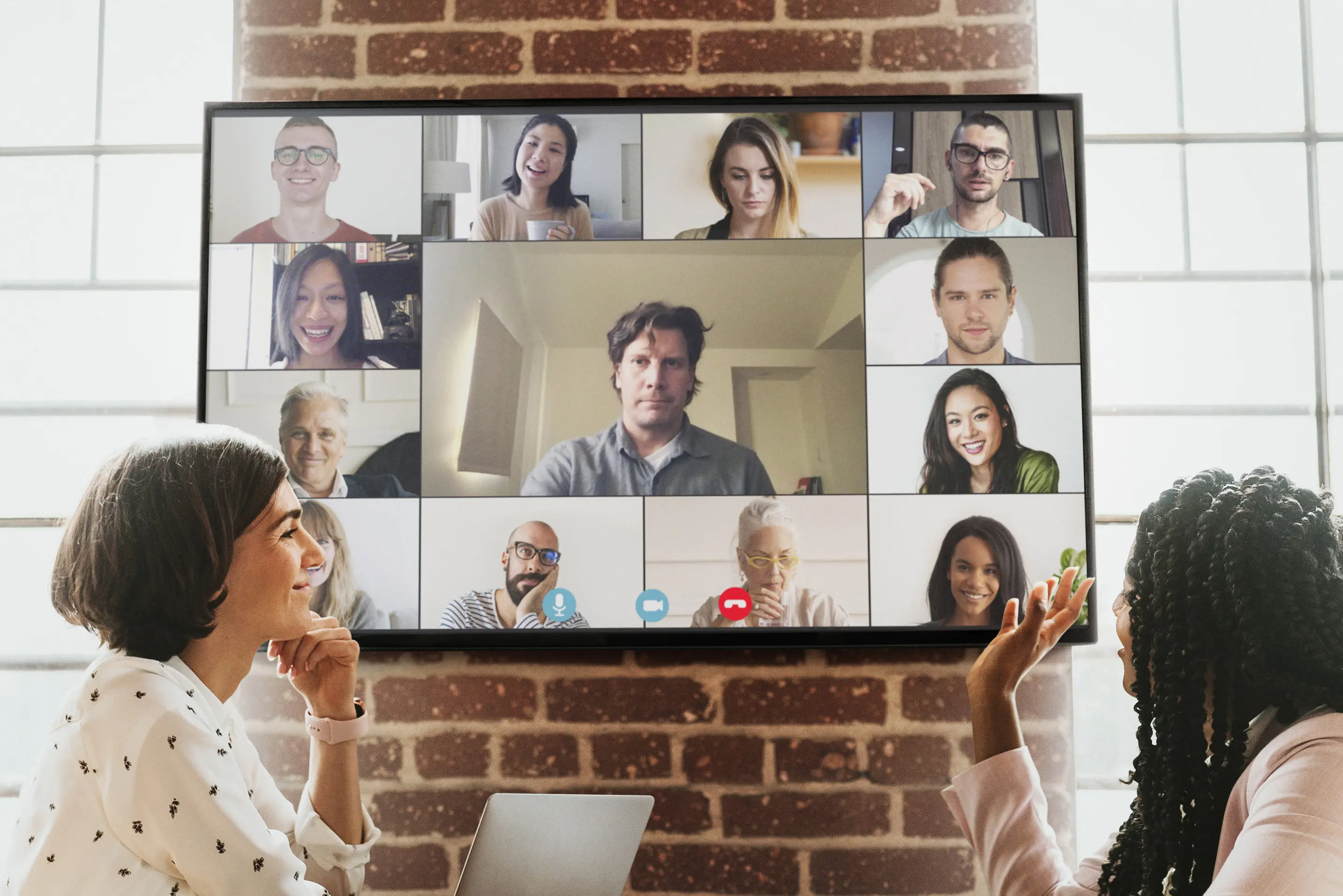 Women in a video conference call in an office