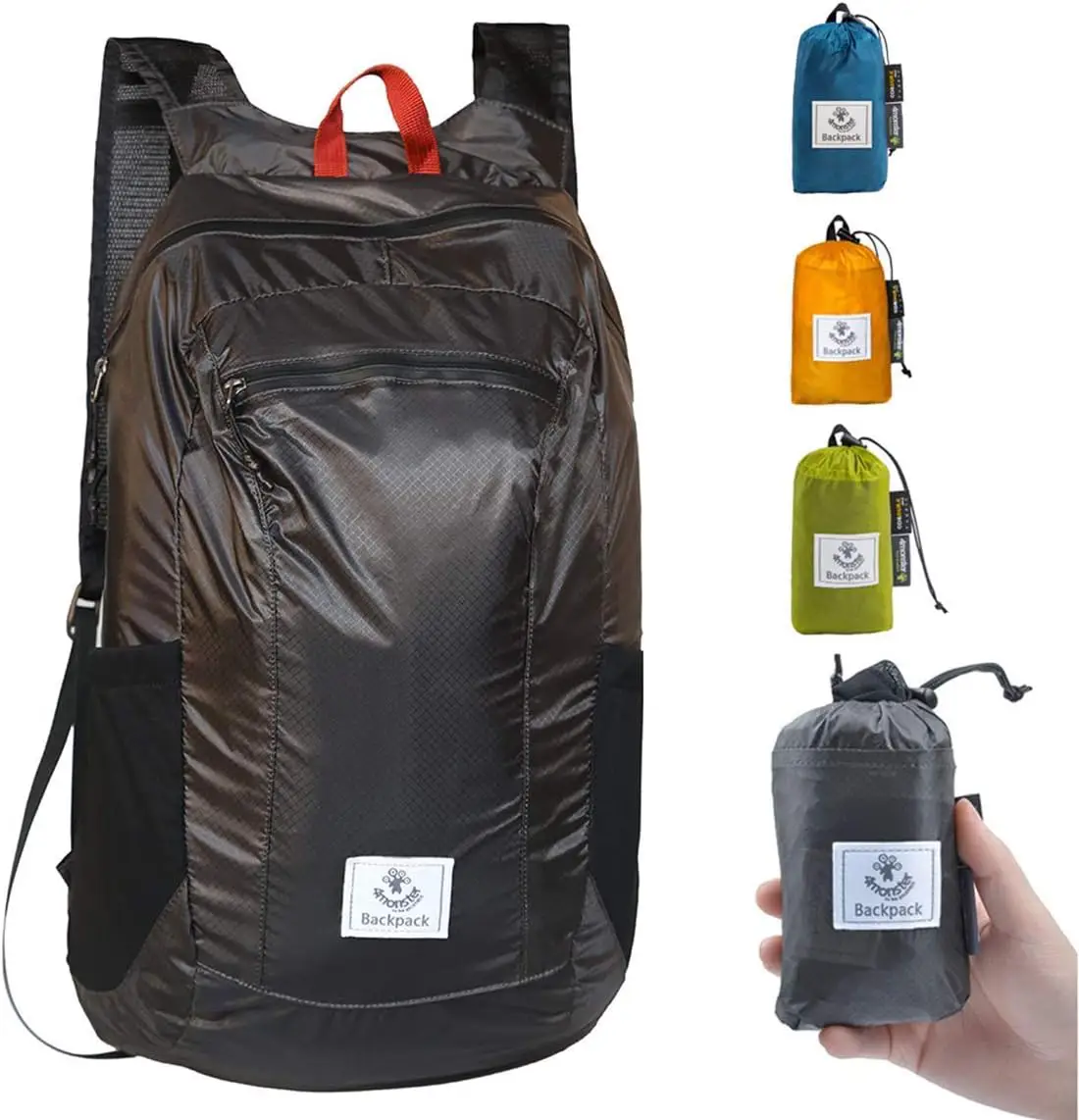 Person holding a black backpack with a red handle, which is a foldable, waterproof, and foldable backpack